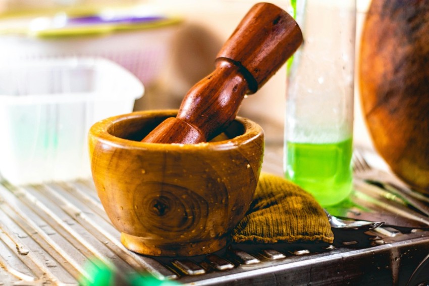 brown wooden mortar and pestle