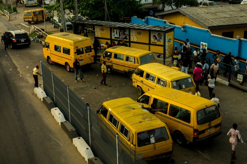 yellow vans on side of road pwMCmK_6