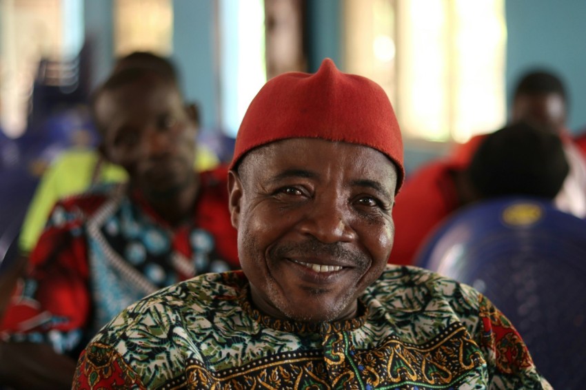 a man wearing a red hat