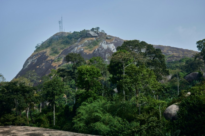 a mountain with a radio tower on top of it