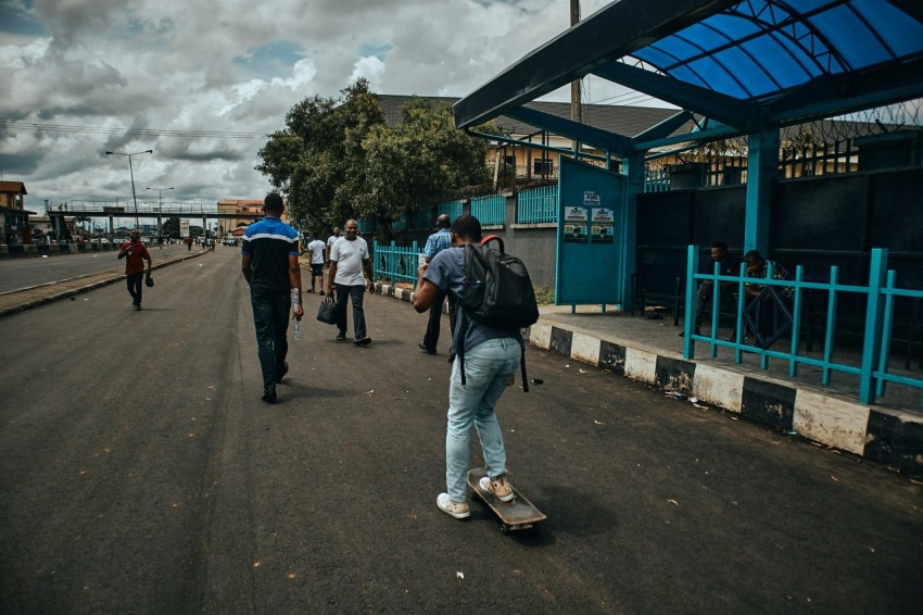 people walking on sidewalk during daytime TAV7I6