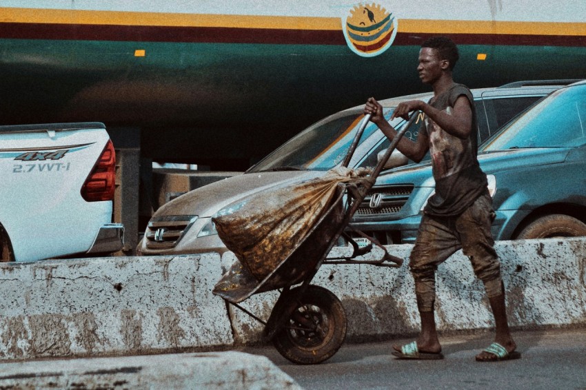 a person pushing a cart