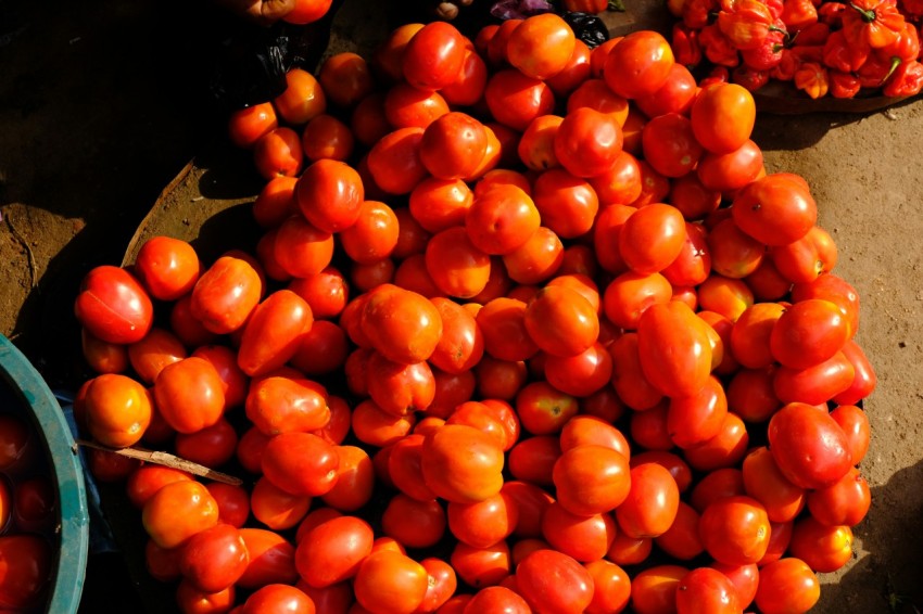 red round fruits on black tray