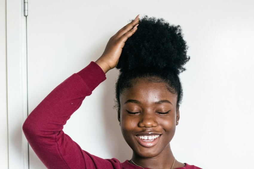 woman touching her hair J