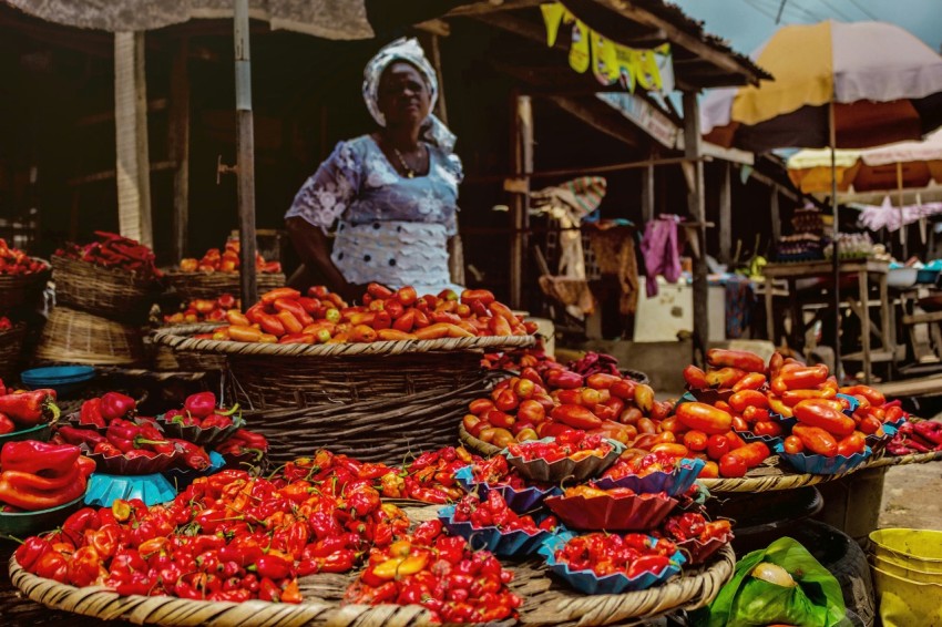 woman in native attire in a marketplace