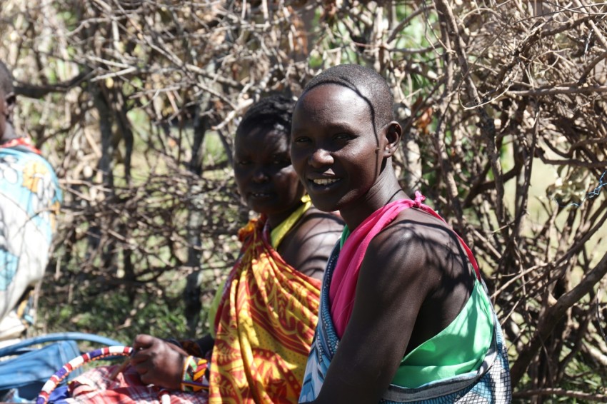 two women wearing assorted color dresses during daytime cvT