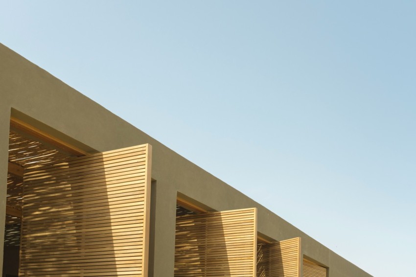 white concrete building under blue sky during daytime