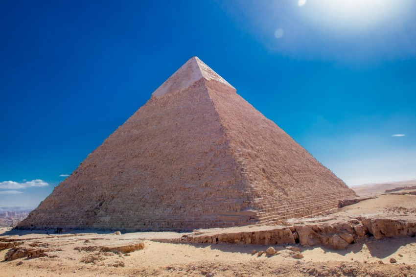 a large pyramid in a desert with pyramid of khafre in the background LzQAnb7