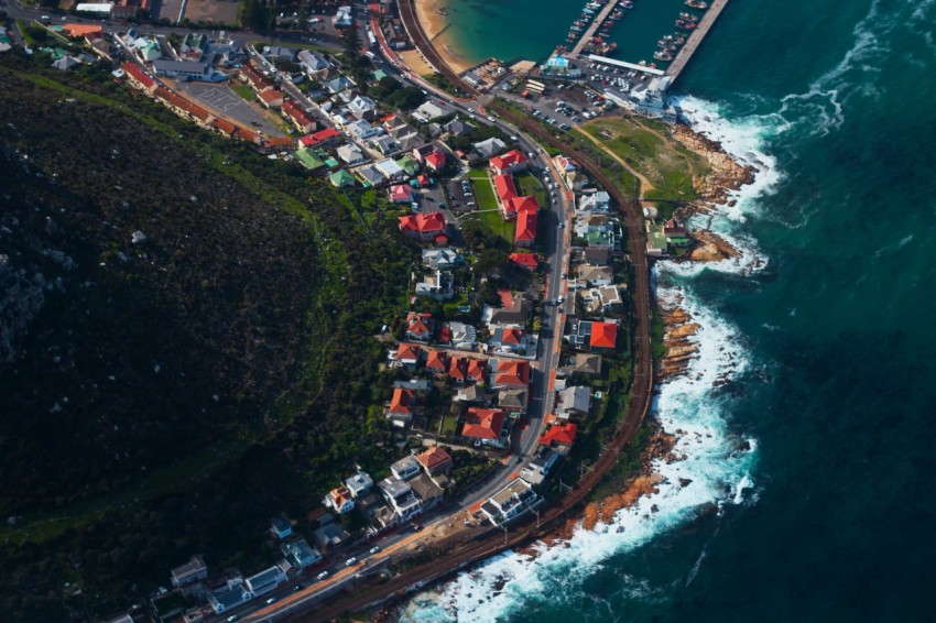 aerial view of city near body of water during daytime