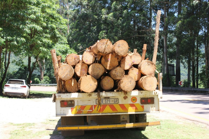 brown wooden crates on yellow truck