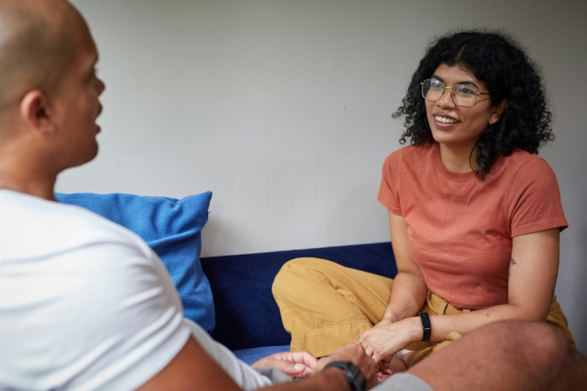 a man and a woman sitting on a couch