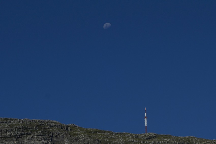 a very tall hill with a very tall tower on top of it