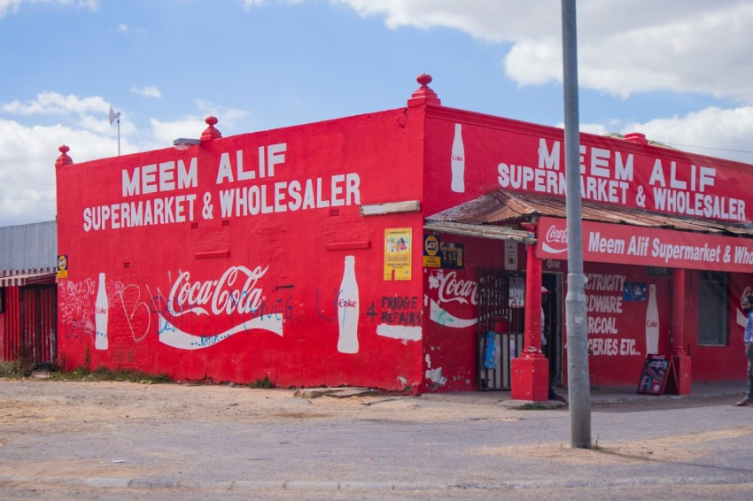 red and white coca cola signage  0y6BFcC