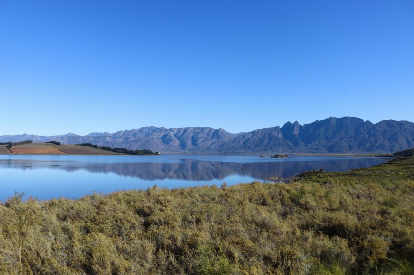 a large body of water surrounded by mountains