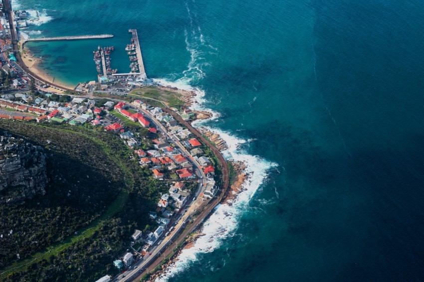 aerial view of city near body of water during daytime