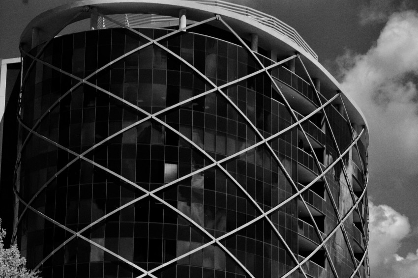 a black and white photo of a large building