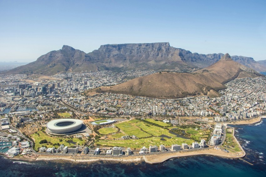 aerial view of city near mountain during daytime