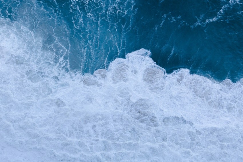 white and blue ocean waves