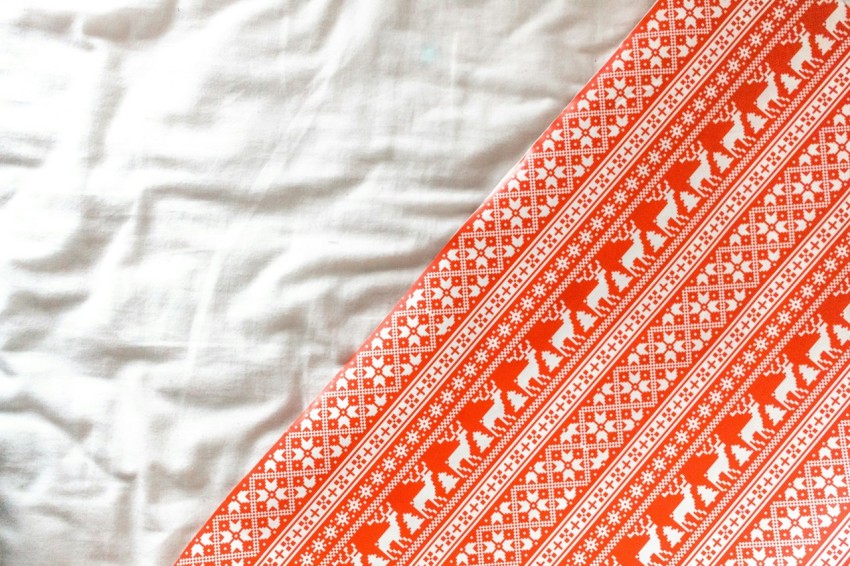 red and white floral textile