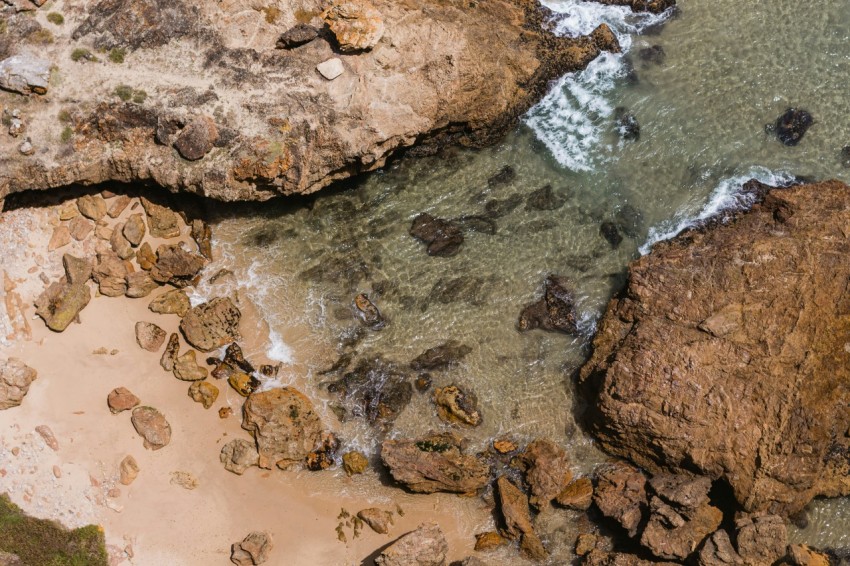 aerial view of boulders and sea XMLlrFZk