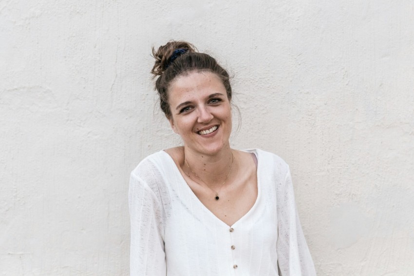 woman standing near white wall