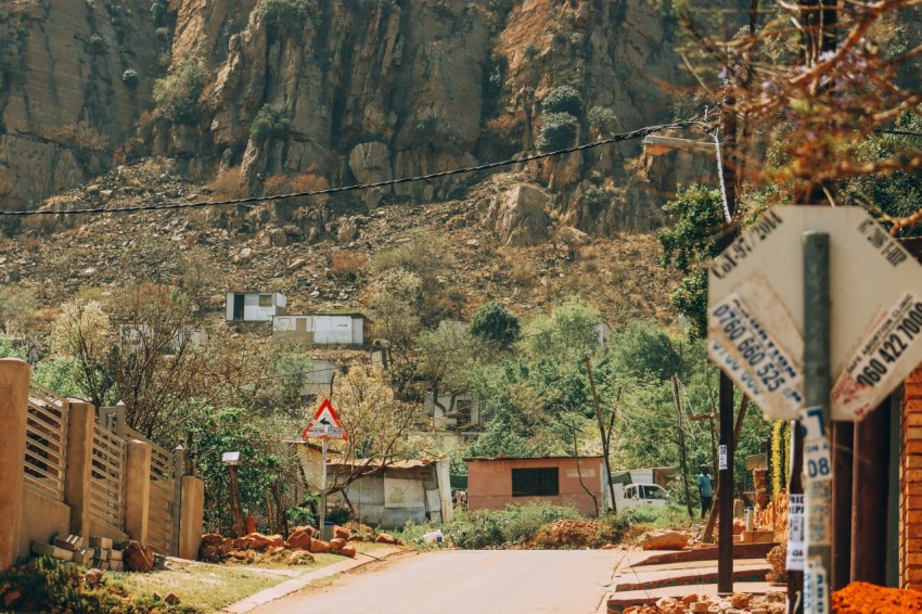 a street with a mountain in the background