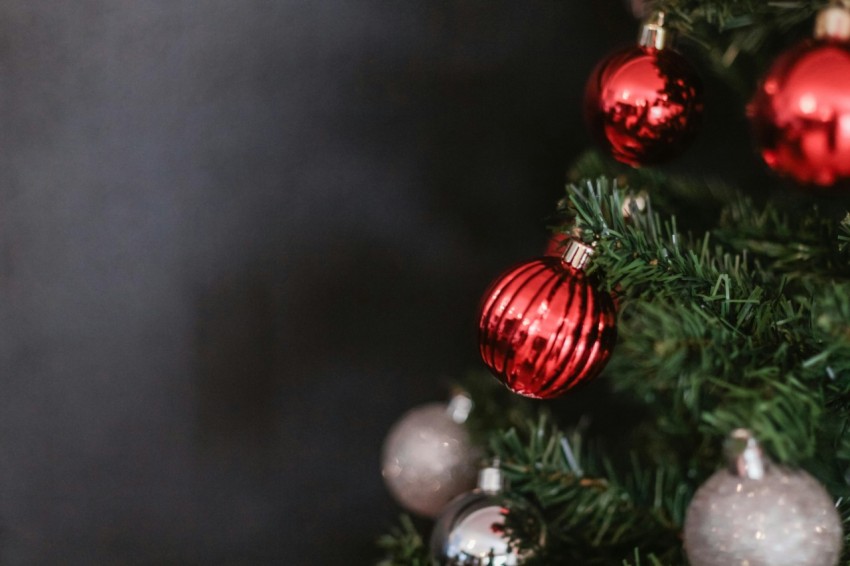 red and silver baubles on christmas tree