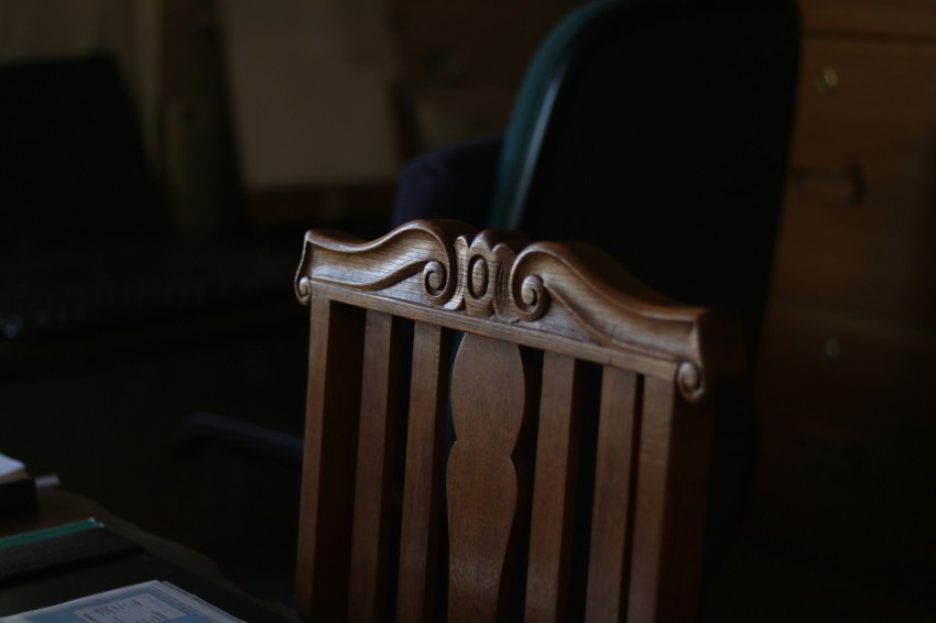 brown wooden armless chair inside room 8raw7IqO