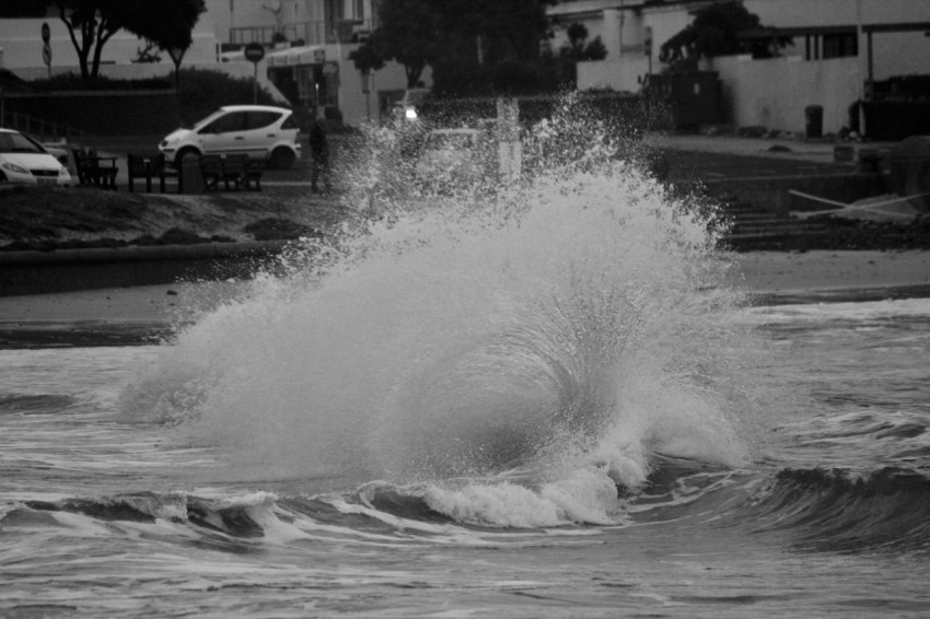 a wave crashing into a road