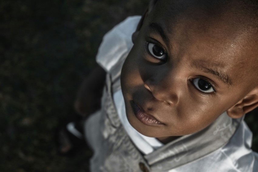 boy in white and gray hoodie