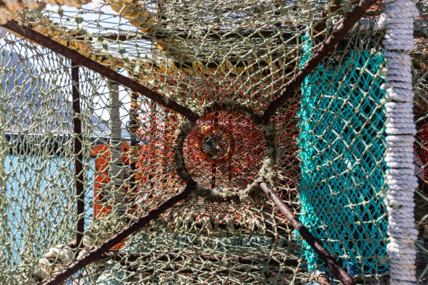 a pile of fishing nets sitting next to each other