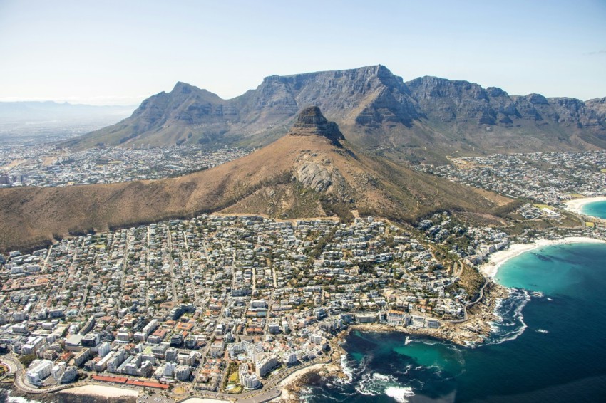 aerial view of city near mountain during daytime