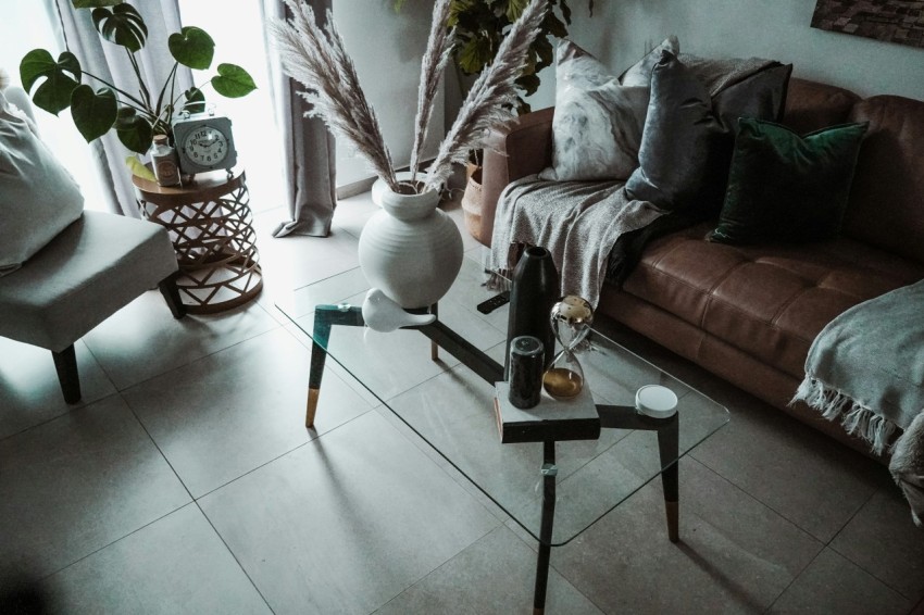 white ceramic vase on glass table