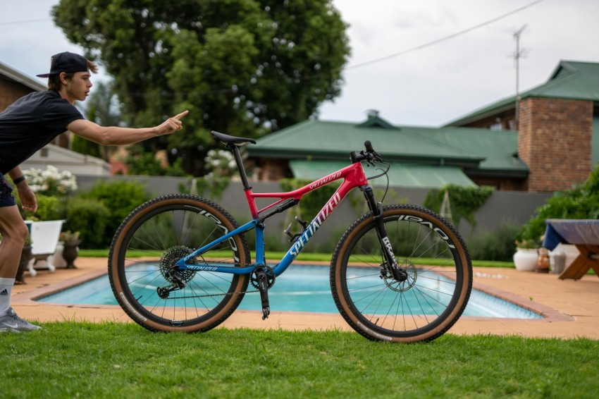 red and blue full suspension mountain bicycle B