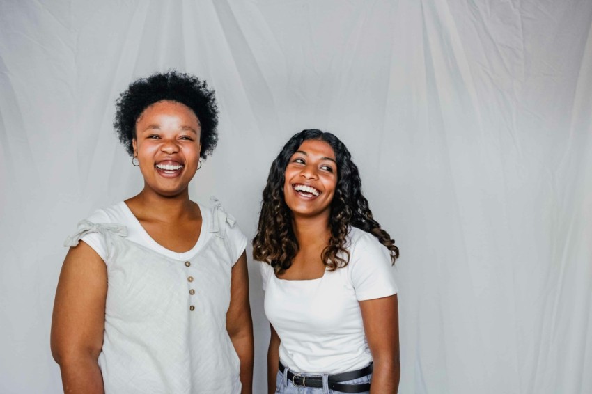 a couple of women standing next to each other