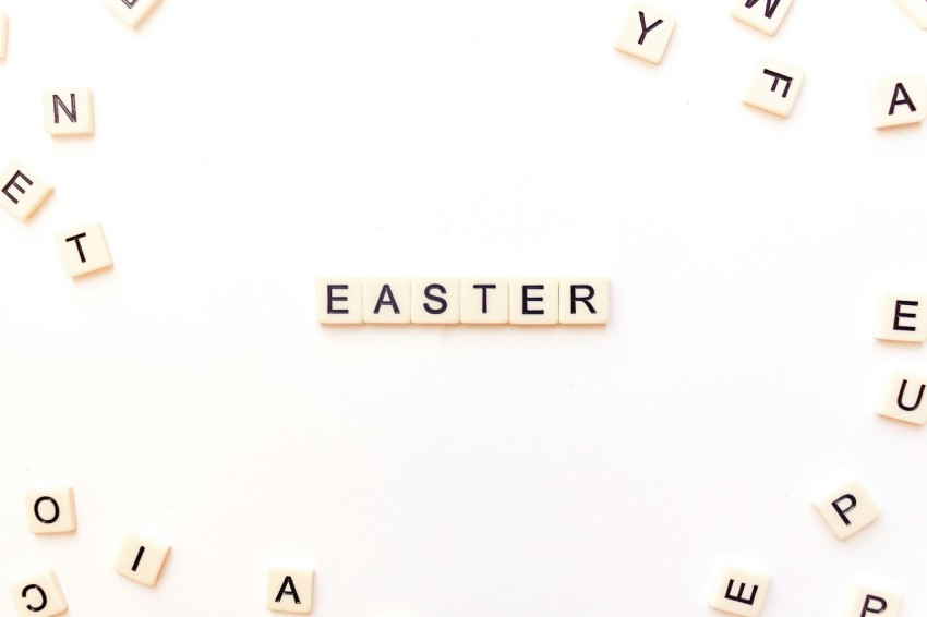 the word easter spelled with scrabbles on a white background