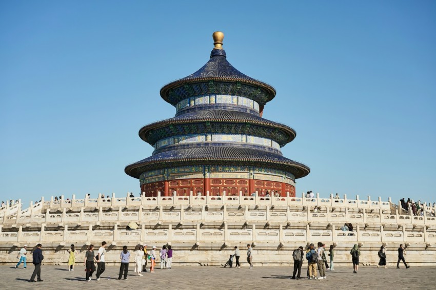 a group of people standing in front of a building