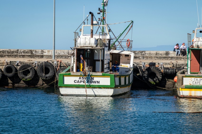 a couple of boats that are sitting in the water