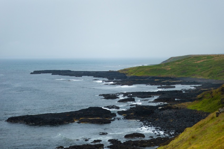 a view of a body of water from a hill