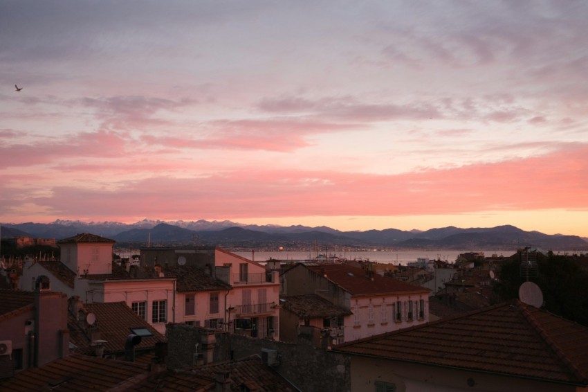 a view of a sunset over a small town