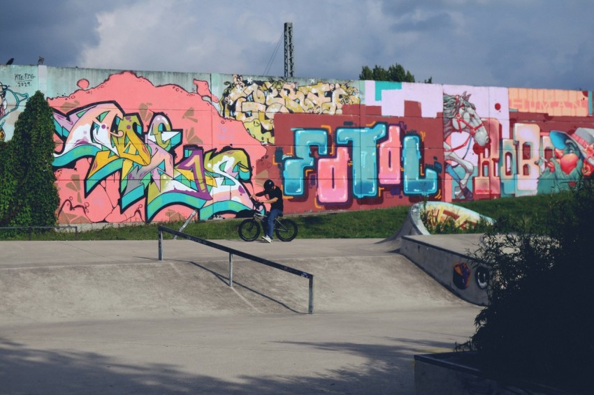 a man riding a skateboard down the side of a ramp