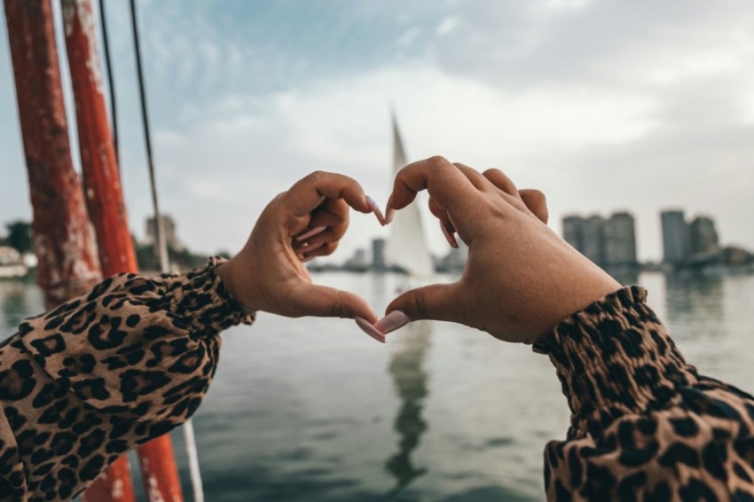 human hands making heart shape