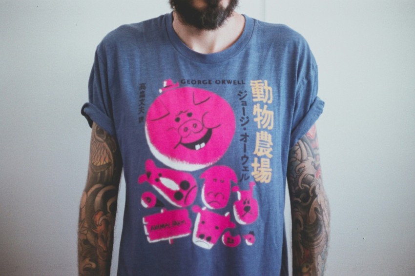 man wearing blue and pink angry bird printed t shirt SoqCV2d