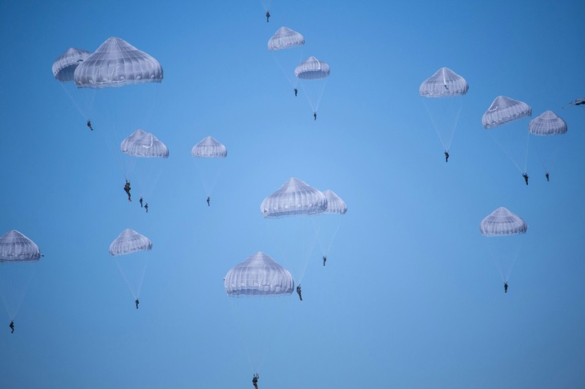 white parachutes during daytime photo