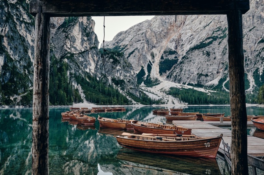 a group of boats in a bay NyH jxg