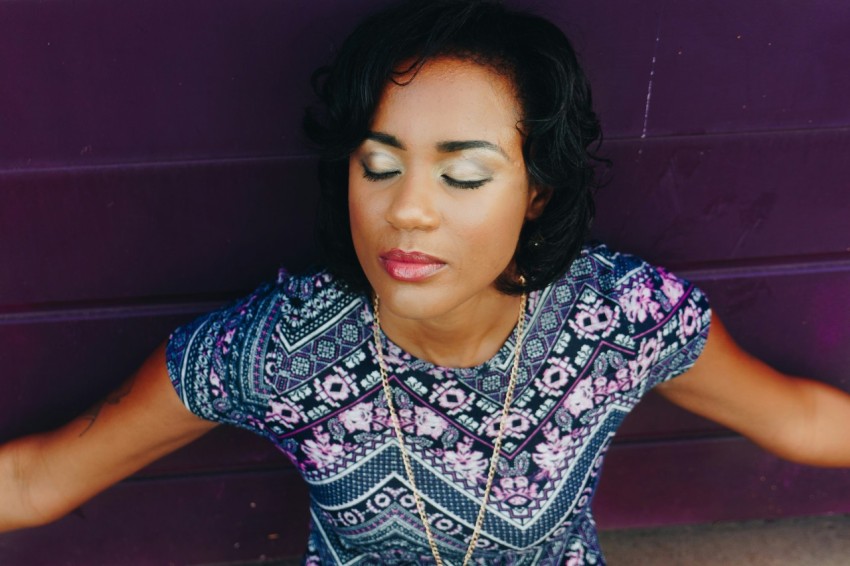 woman wearing pink and blue floral crew neck shirt