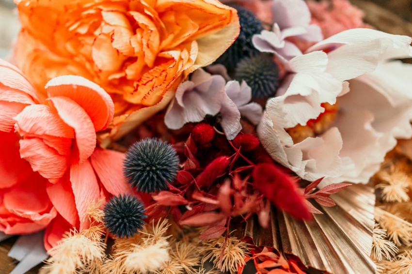 a bunch of flowers that are on a table hi hbH9S