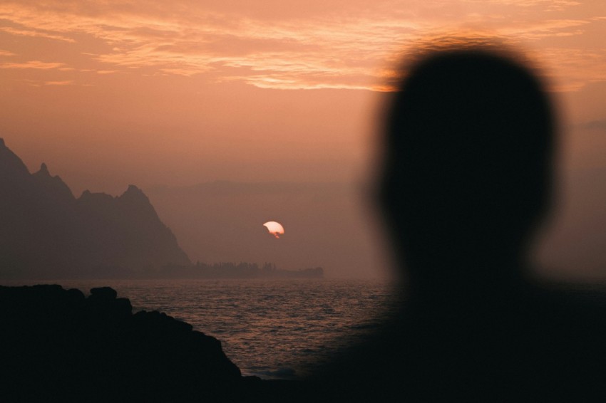 silhouette of man during golden hour