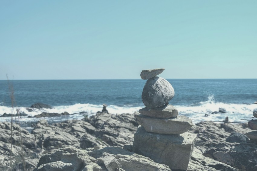 gray stone formation on beach