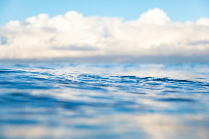 calm sea under blue sky